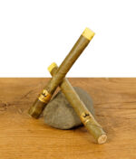 King Palm Banana Cream Blunt Cones Packung mit zwei auf Palmblättern gerollten Blunts."