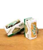 Zwei Purize Brown Rolls Packungen auf Holzfläche, eine stehend, eine liegend