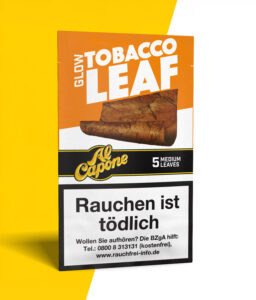 Al Capone Glow Tobacco Leaf Blunt Wrap auf gelb weißem Hintergrund