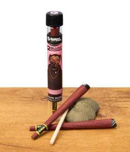 G-Rollz Blunt Cones Purple Haze vorgerollte King Size Hanf-Cones, Verpackung und Stopfhilfe auf Holzoptik.