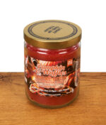 Rote Duftkerze von Smoke Odor mit "Pumpkin and Waffles" Aufschrift