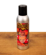 Smoke Odor Exterminator Spray Cherry Bomb mit enzymatischer Formel gegen Rauchgerüche in einer silbernen Dose auf einer Holzoberfläche.