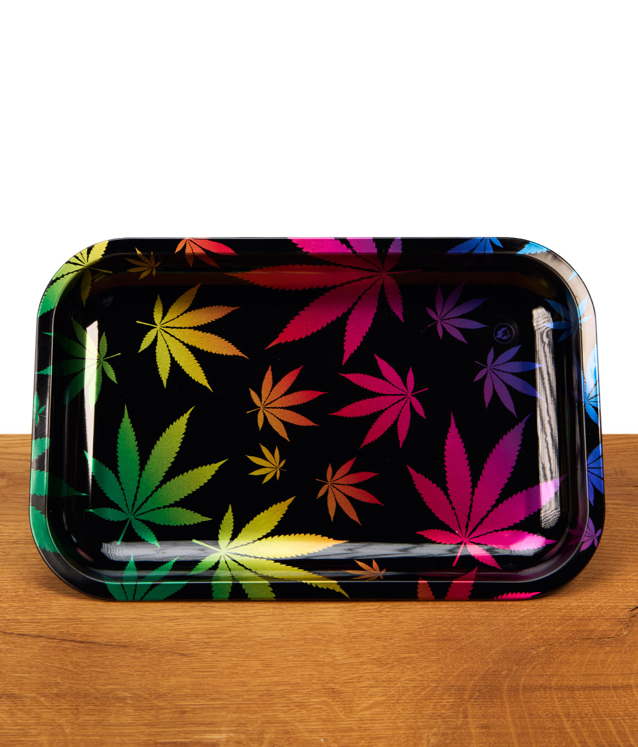 fire-flow-rolling-tray-leaves-gradient-small-jpg Fire-Flow Rolling Tray Leaves Gradient Small auf Holz. Schwarzes Metall-Drehtablett mit bunten Hanfblättern und hohem Rand.